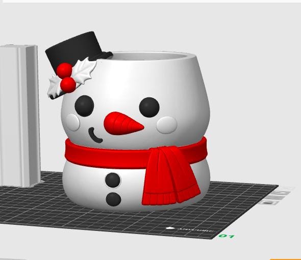 May include: A white snowman-shaped planter or container featuring a black top hat with red holly berries, a red scarf, a carrot-shaped orange nose, black circular eyes, and two black buttons on the lower section, rendered in a 3D digital design format.