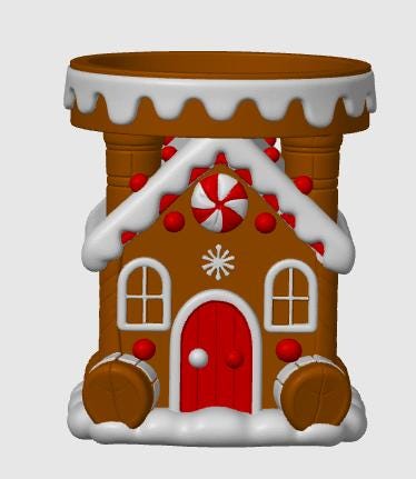 May include: A brown gingerbread house wax warmer featuring a red door, white icing accents, and red candy decorations. The structure includes a top dish for wax, a central peppermint candy detail, and a white snowy base with rounded brown accents.