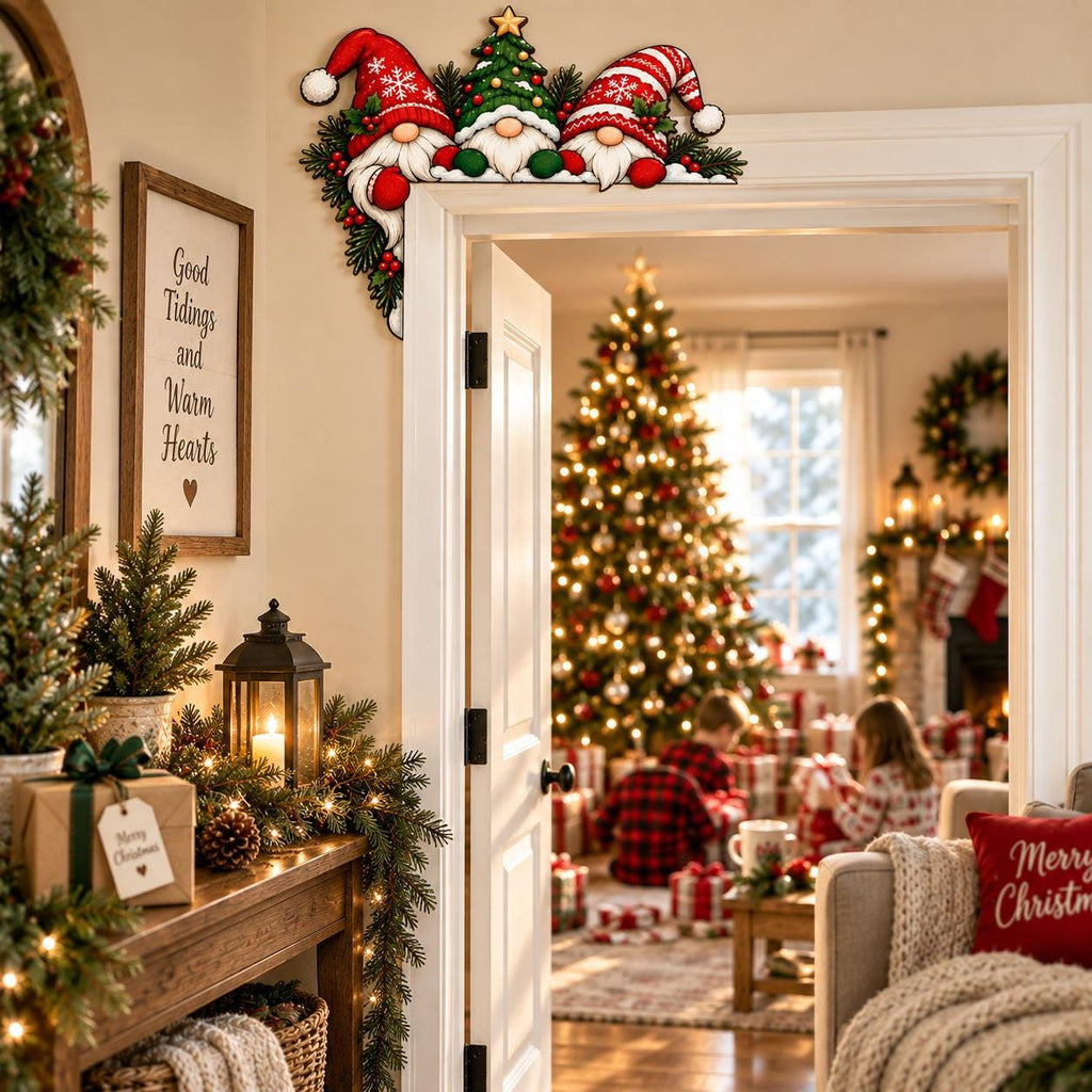 May include: A decorative wooden door corner sign featuring three gnomes wearing red and white hats, accented with green pine branches and red berries. The gnomes are positioned together, with the center gnome wearing a small Christmas tree hat.