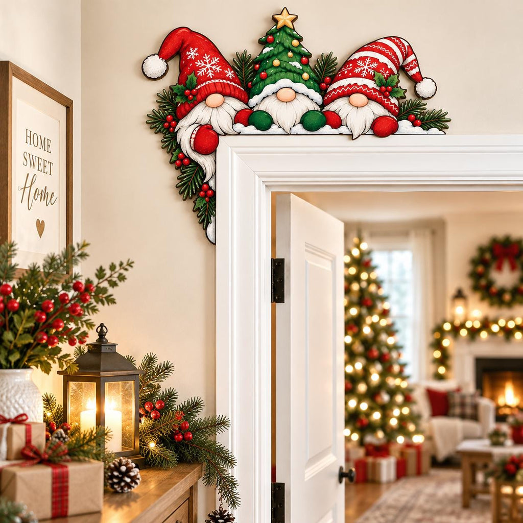 May include: A decorative wooden door corner sign featuring two gnomes wearing red and white hats flanking a central green Christmas tree with a yellow star topper, accented with pine branches and red berries, designed to fit the corner of a door frame.