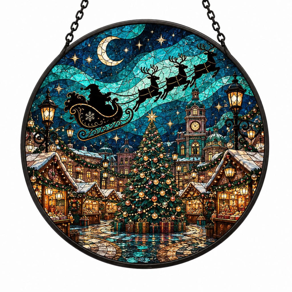 Christmas market stained glass suncatcher with Santa and reindeer flying above a decorated Christmas tree, glowing village buildings, stars, and teal night sky.