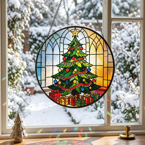 May include: A circular stained glass suncatcher featuring a green Christmas tree decorated with red and blue ornaments and a yellow star topper. The tree is surrounded by colorful gift boxes, all framed within a black metal border with a chain.
