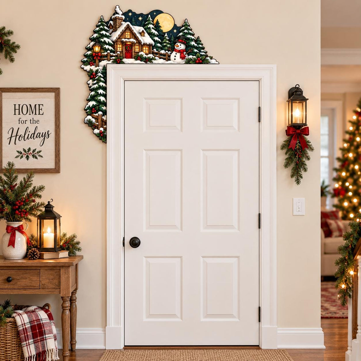 May include: A decorative wooden door corner sign featuring a winter scene with a snow-covered cabin, evergreen trees, a snowman, and a bright yellow moon against a dark blue starry sky, designed to frame the upper right corner of a door frame.