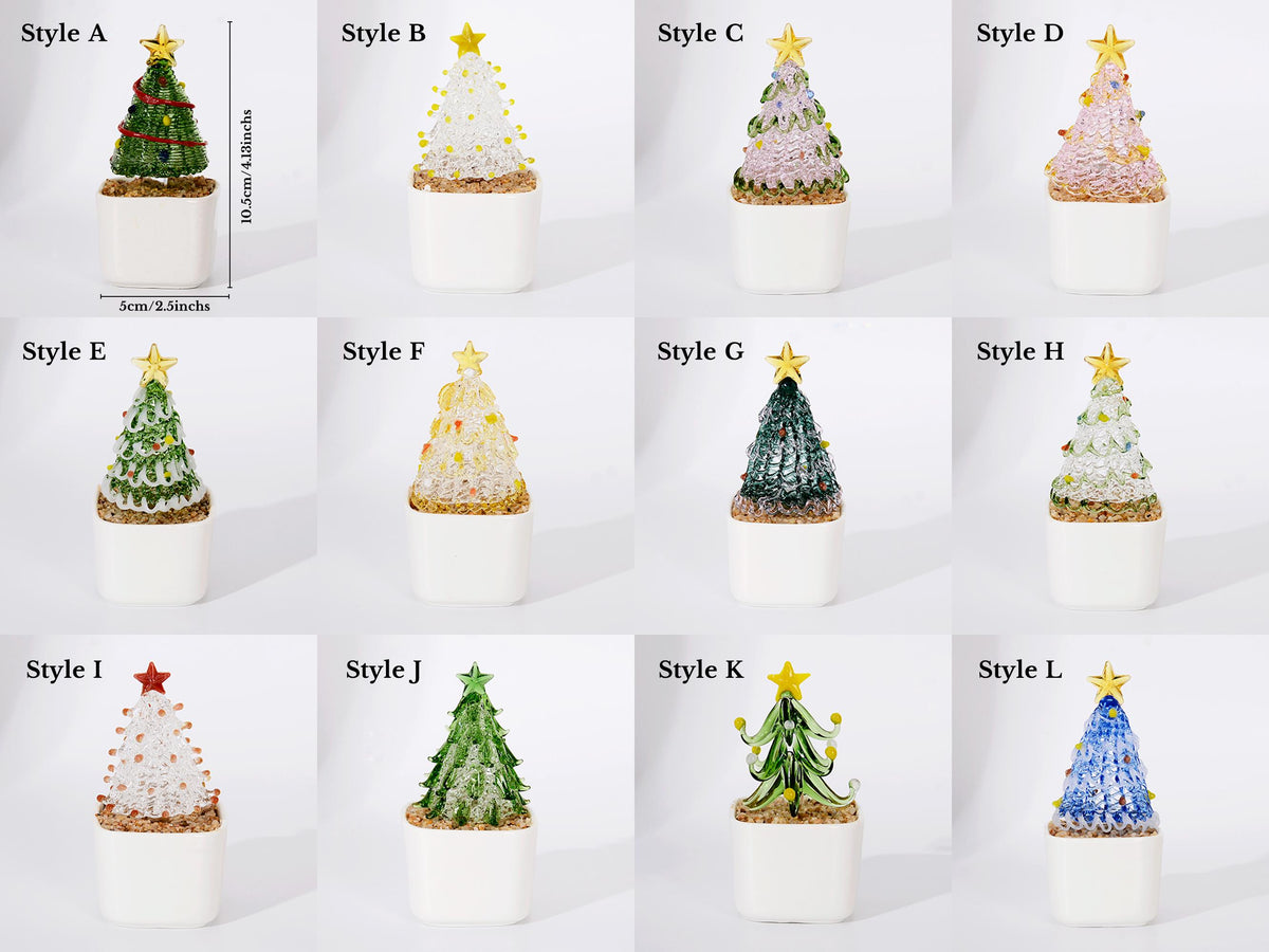 May include: Twelve miniature glass Christmas tree ornaments in white square pots, labeled Style A through L. Each tree features a gold star topper and measures 4.13 inches tall by 2.5 inches wide. The trees vary in color, texture, and decorative detail.