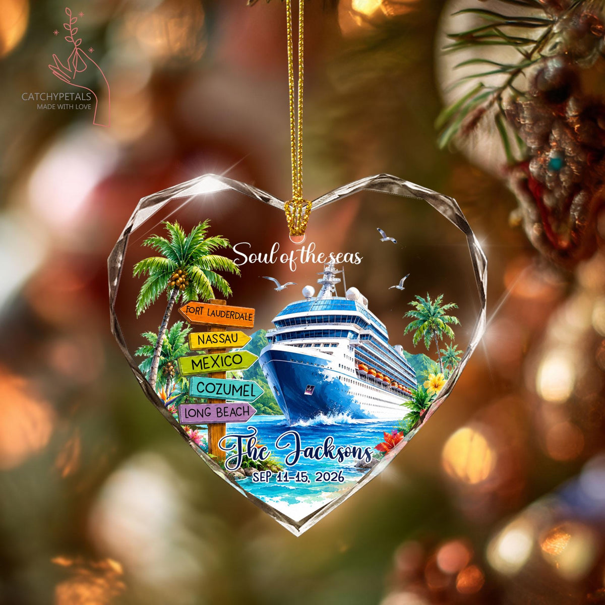 May include: A heart-shaped glass ornament featuring a cruise ship on blue water, palm trees, and a directional signpost with the text Fort Lauderdale, Nassau, Mexico, Cozumel, and Long Beach. It includes the text Soul of the seas, The Jacksons, and Sep 11-15, 2026.