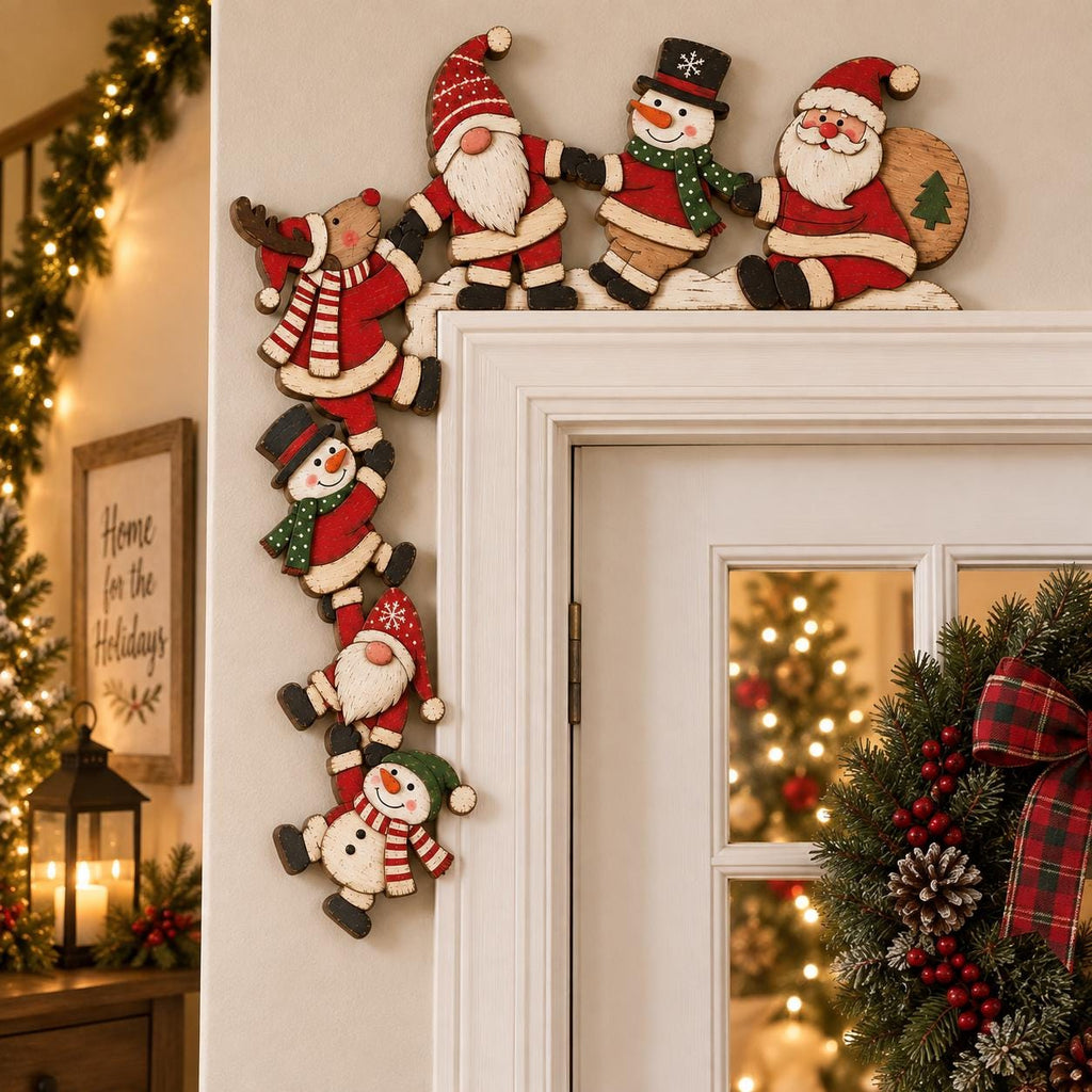 May include: A wooden door corner decoration featuring a chain of festive characters including a reindeer, gnomes, snowmen, and Santa Claus. The figures are painted in red, white, green, and brown, arranged to fit along the top and side of a door frame.