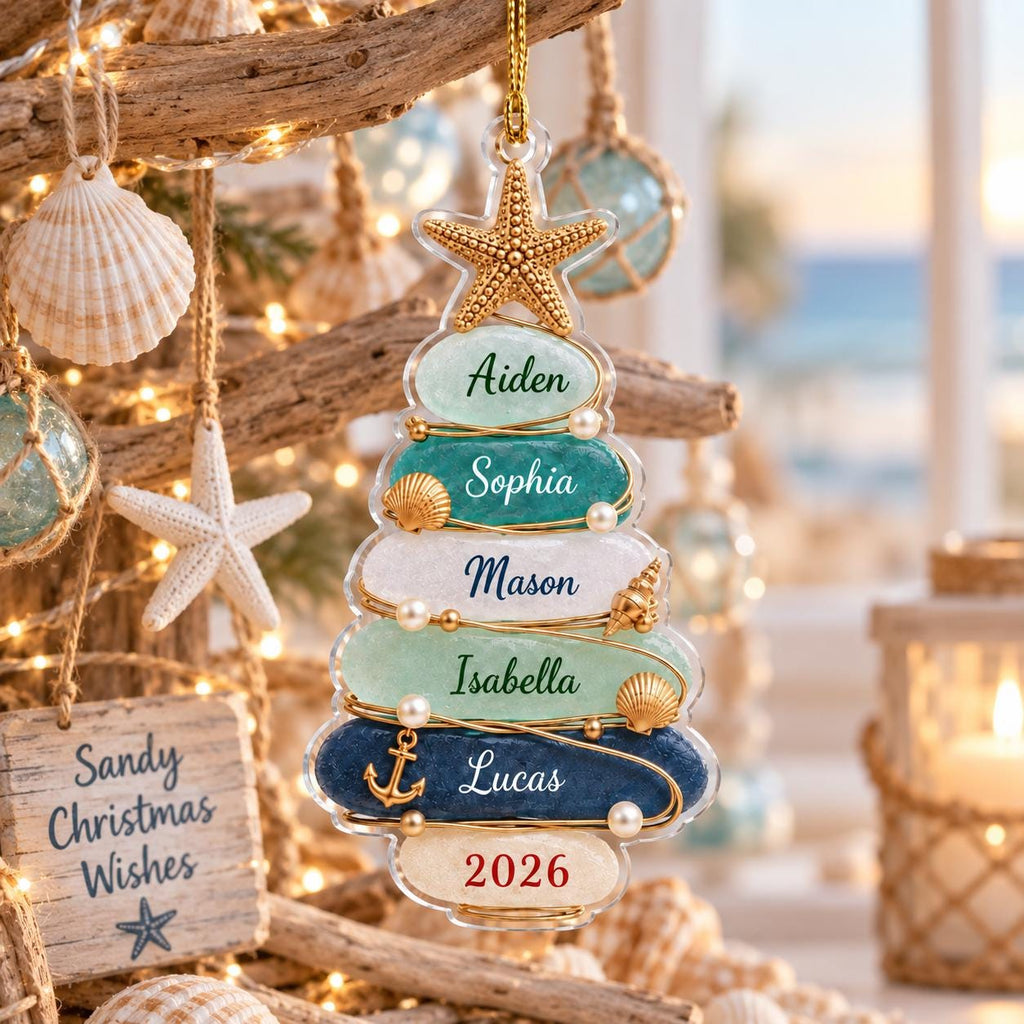 May include: A clear, tree-shaped Christmas ornament featuring a gold starfish topper and six horizontal layers in shades of blue, green, and white. Each layer is personalized with names: Aiden, Sophia, Mason, Isabella, Lucas, and the year 2026.