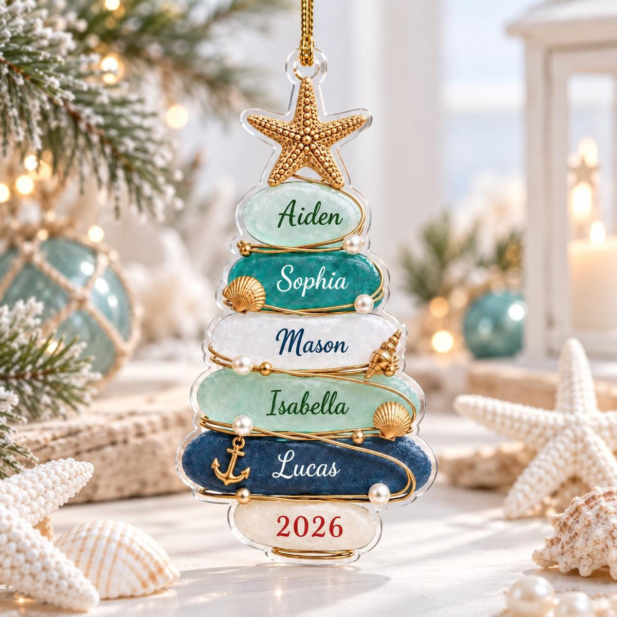 May include: A clear, tree-shaped hanging ornament featuring six stacked, rounded segments in shades of light green, teal, white, and dark blue. Each segment is personalized with names Aiden, Sophia, Mason, Isabella, Lucas, and the year 2026.