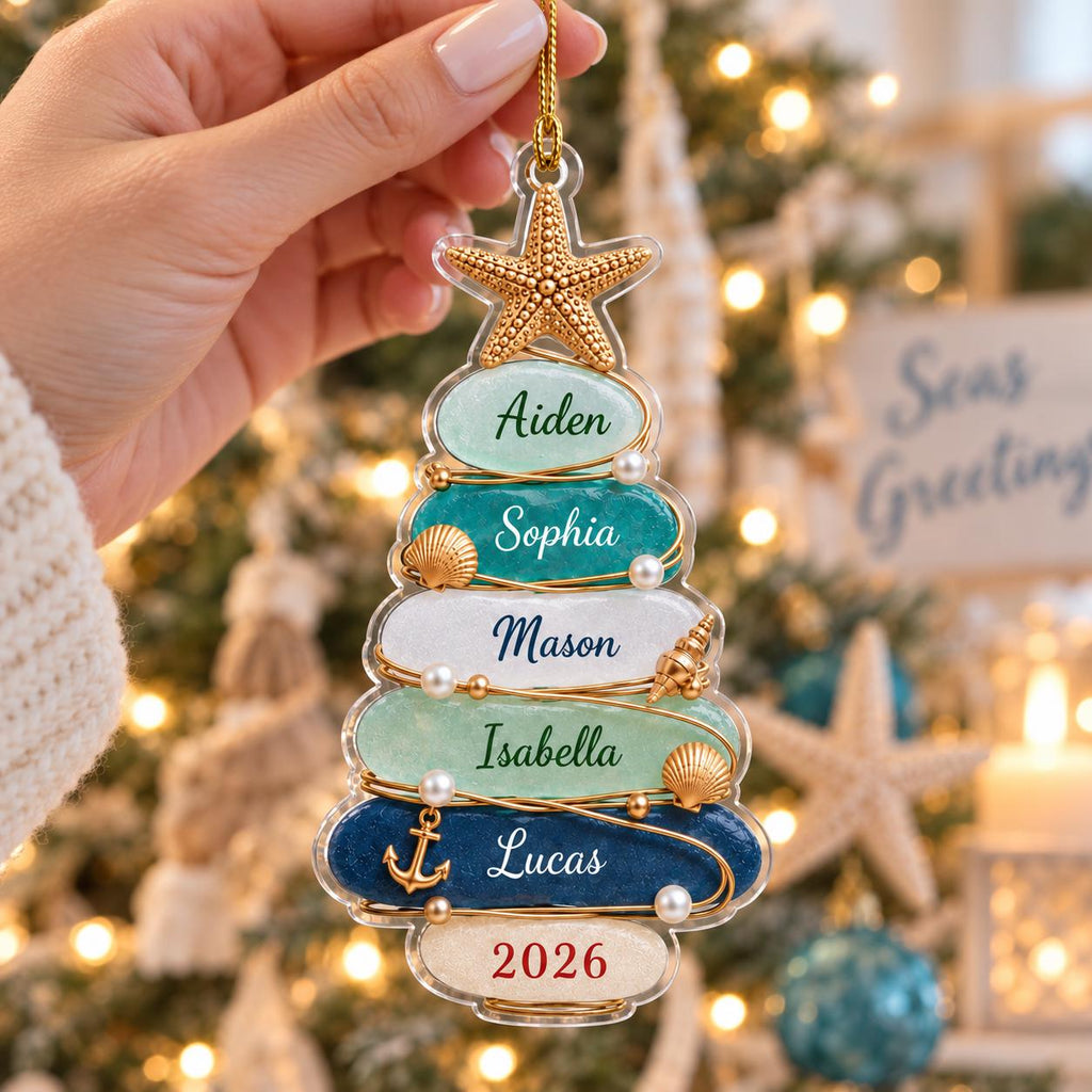 May include: A clear acrylic Christmas tree ornament featuring five horizontal layers in shades of light green, teal, white, mint, and dark blue. The layers are personalized with the names Aiden, Sophia, Mason, Isabella, and Lucas, with 2026 at the base.