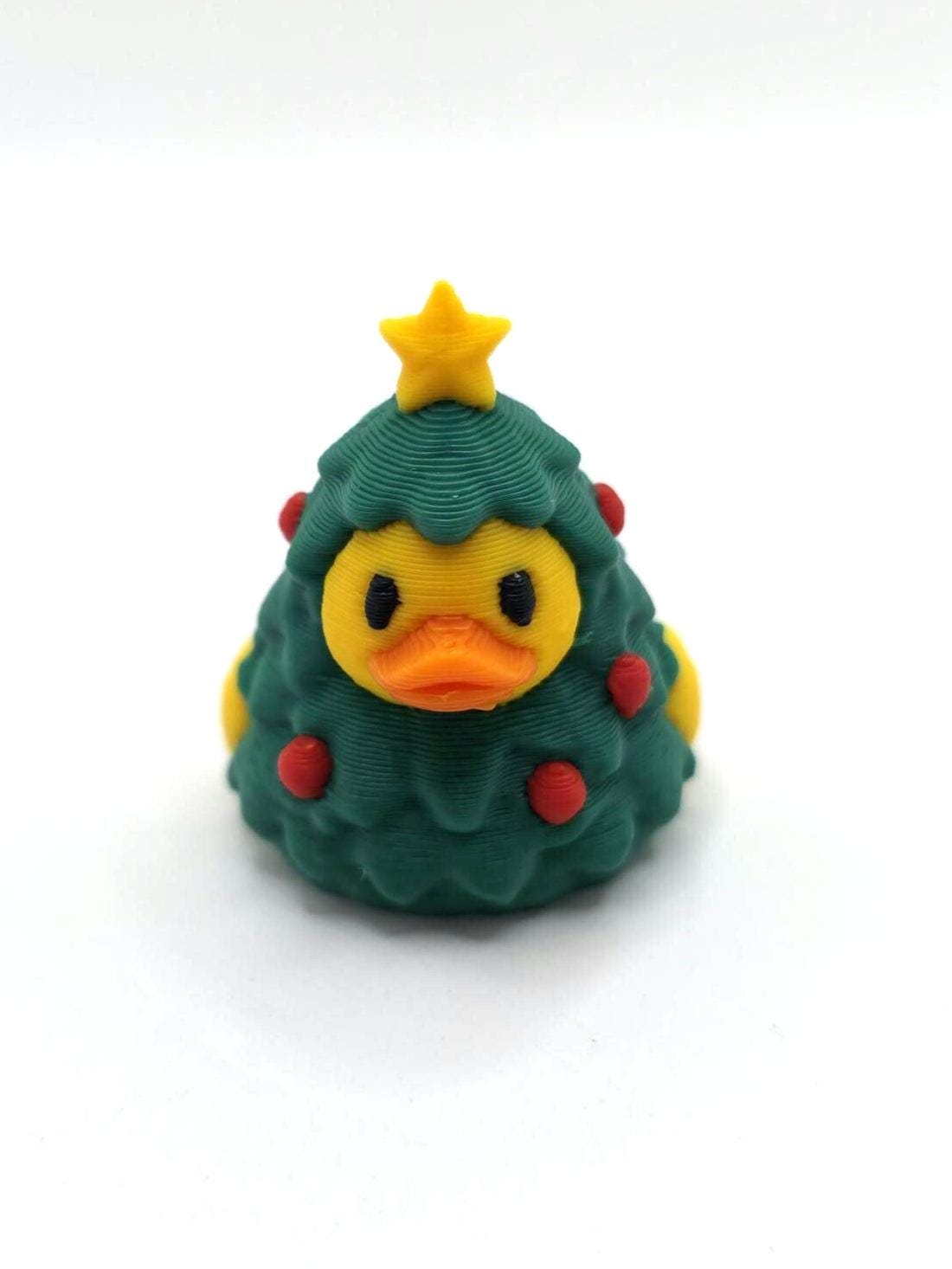 Mini Christmas Tree Duck, 1 inch 3D printed holiday rubber duck collectible with green Christmas tree design, red ornaments and yellow star, miniature Christmas cruise duck for hiding, stocking stuffers and holiday gifts.