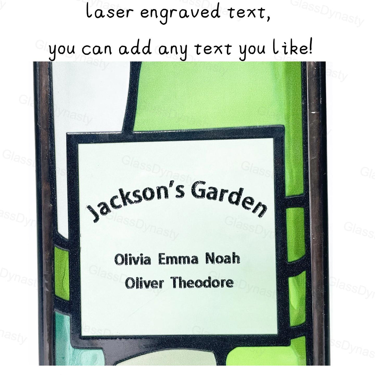 May include: A rectangular, stained glass panel with the text "Jackson's Garden" and a list of names. The panel has a white background with green and black accents. The text "laser engraved text, you can add any text you like!" is at the top.