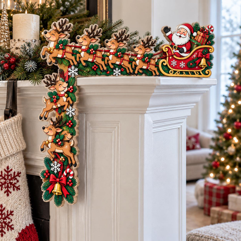 May include: A decorative wooden corner piece featuring a festive Christmas scene with Santa Claus in a red sleigh pulled by seven reindeer. The design includes green pine branches, red berries, white snowflakes, a gold bell, and a red bow.