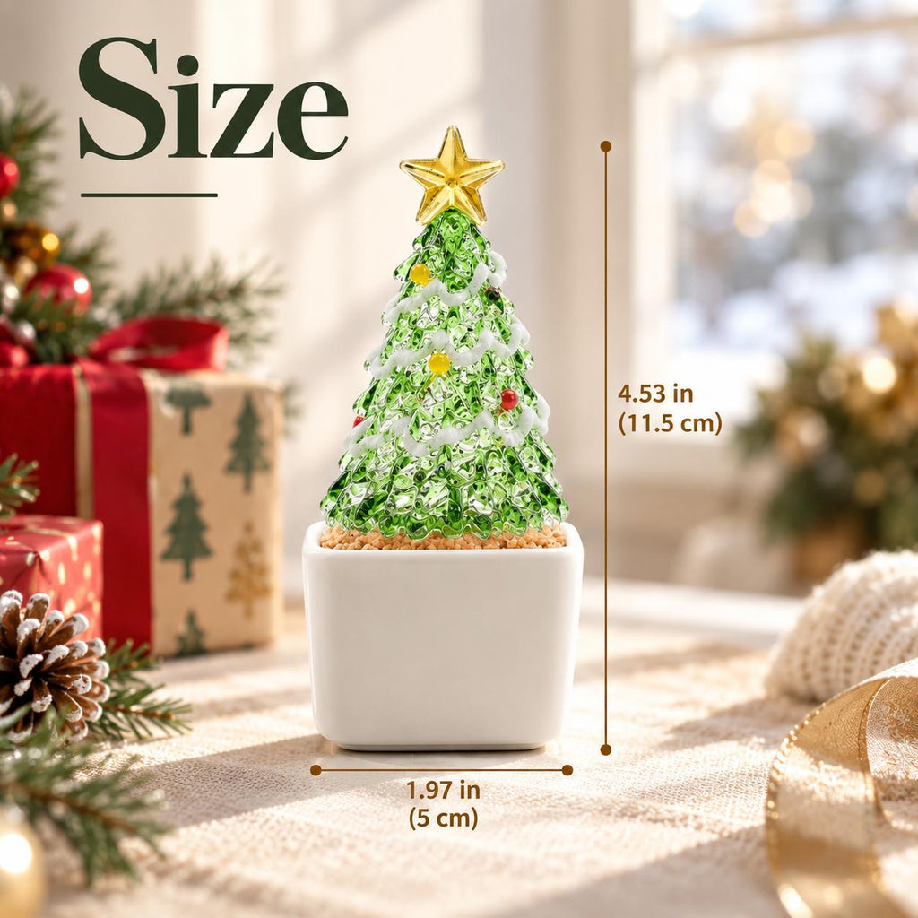 May include: A green glass Christmas tree figurine with a gold star topper, white garland, and colorful ornaments in a white square pot. The tree measures 4.53 inches in height and 1.97 inches in width, as indicated by the text Size on the image.