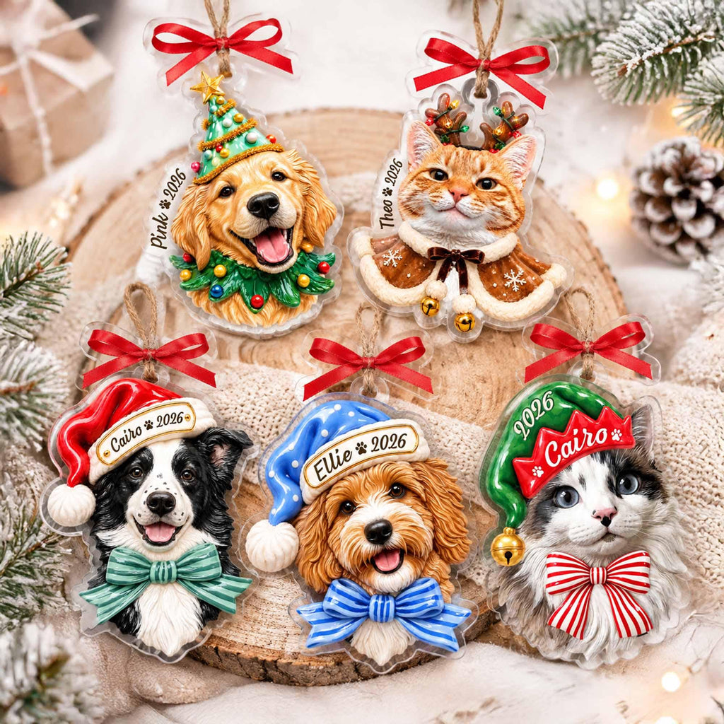 May include: Five custom Christmas ornaments featuring portraits of dogs and cats. Each ornament includes a red ribbon hanger, a name, and the year 2026. The designs include a golden retriever, an orange tabby cat, a border collie, a doodle, and a cat.