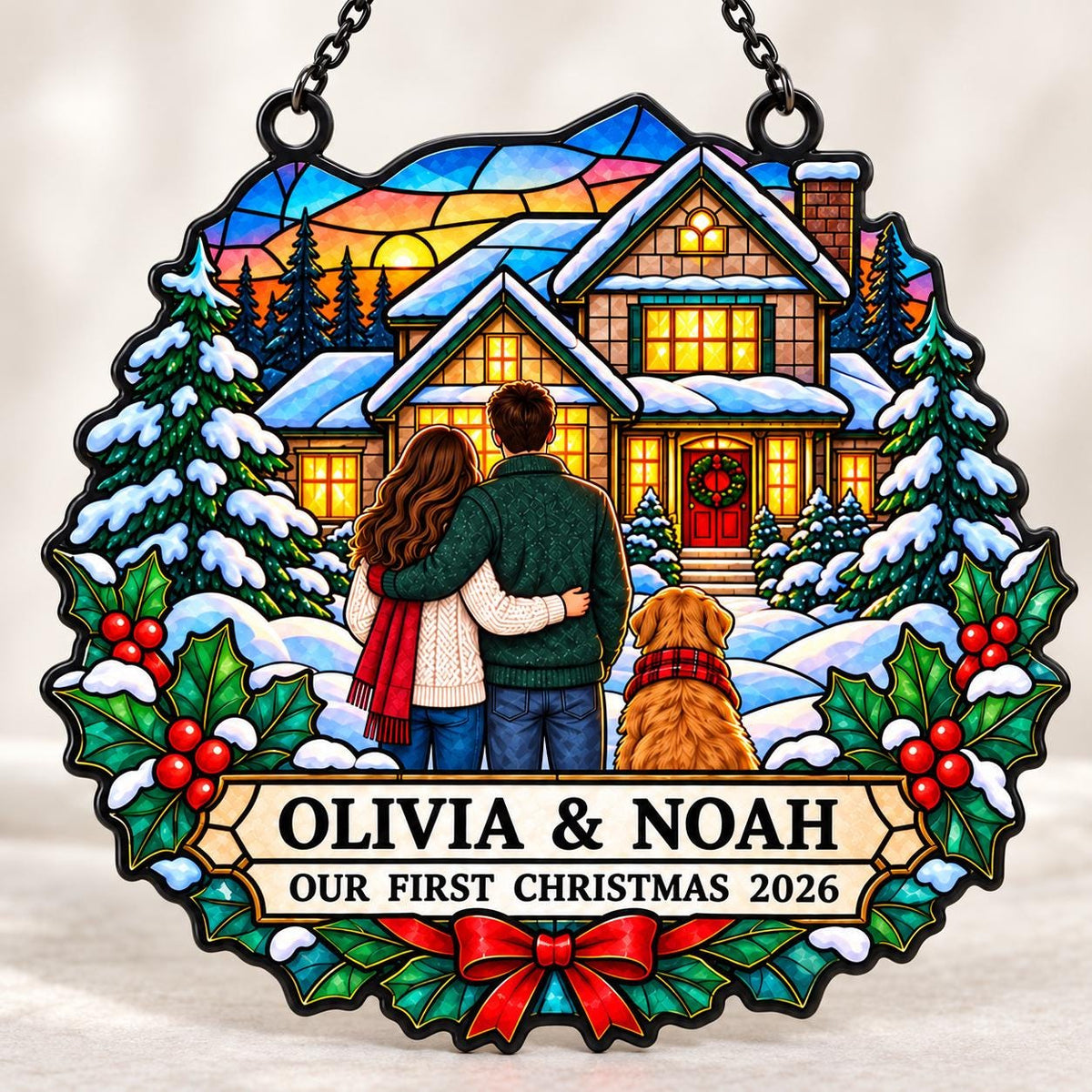 May include: A circular stained-glass style hanging ornament featuring a couple and a dog standing before a snow-covered house at sunset. The text reads OLIVIA & NOAH OUR FIRST CHRISTMAS 2026. The design includes pine trees, holly leaves, and a red bow.