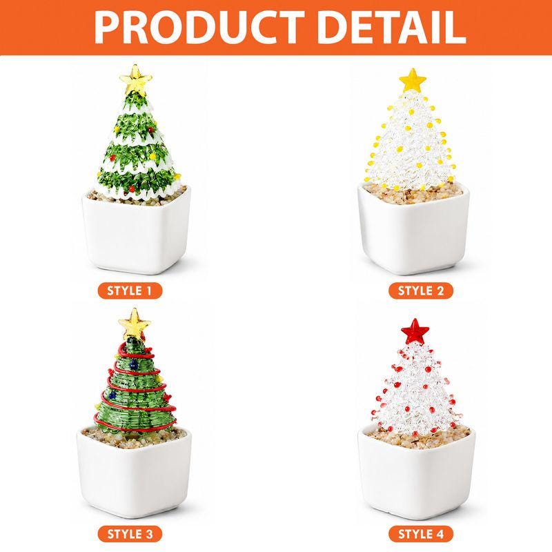 May include: Four decorative tabletop Christmas tree ornaments in square white pots. Style 1 is green with white garland and a gold star. Style 2 is white with yellow beads and a yellow star. Style 3 is green with red wire and a gold star. Style 4 is white with red beads and a red star.