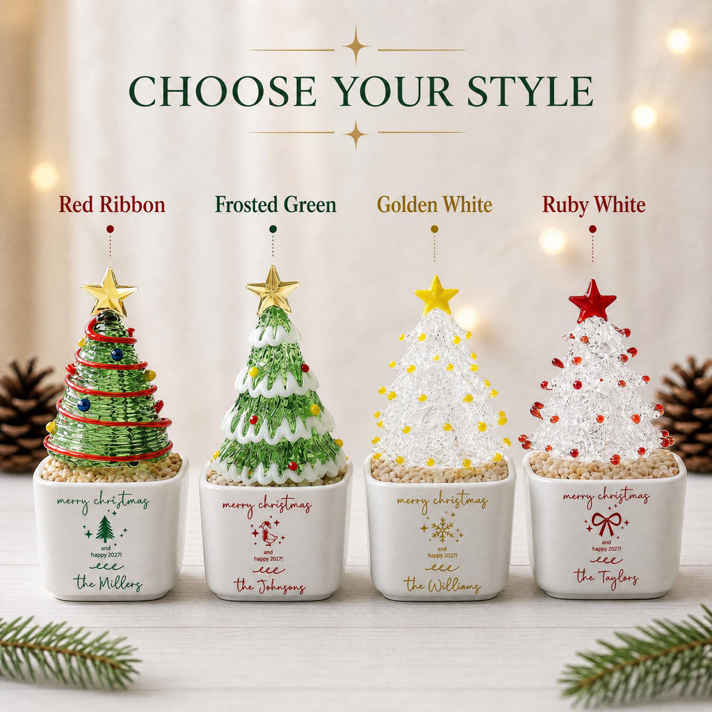 May include: Four miniature Christmas tree decorations in square white ceramic pots. Styles include Red Ribbon, Frosted Green, Golden White, and Ruby White. Each tree features a star topper and colorful accents, with custom text printed on the pots.