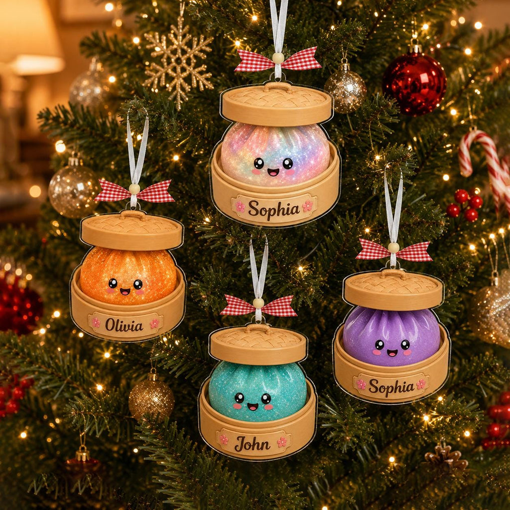 May include: Four hanging ornaments shaped like bamboo steamers containing colorful, glittery, smiling dumplings. Each steamer features a white ribbon with a red and white checkered bow and a name tag reading Sophia, Olivia, or John.