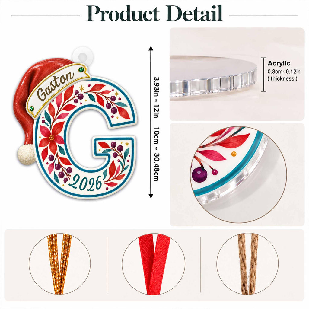 May include: A letter G acrylic ornament featuring a red Santa hat, floral patterns in red and teal, and the text Gaston and 2026. It measures 3.93 inches to 12 inches in height and 0.12 inches in thickness, with three different hanging cord options.
