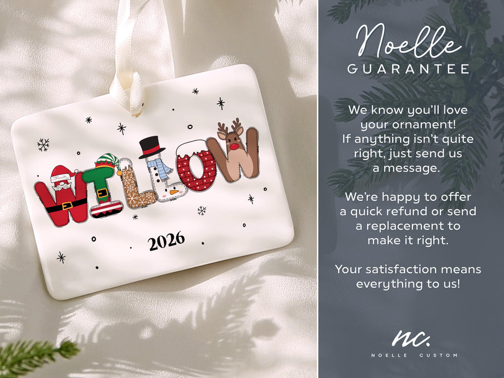 May include: A rectangular white ceramic Christmas ornament featuring the name WILLOW spelled out in festive holiday-themed letters, including Santa, elf, gingerbread, snowman, and reindeer motifs, with the year 2026 printed below in black.
