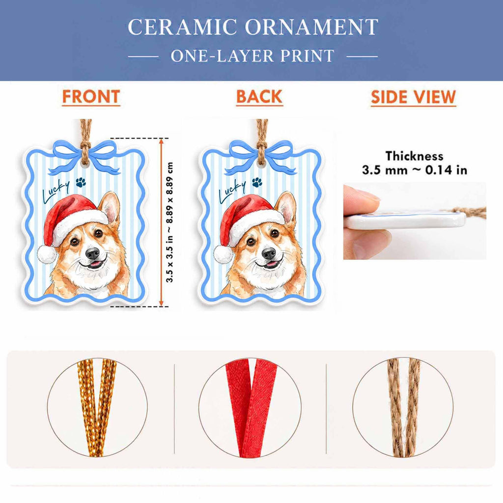 May include: A ceramic ornament featuring a corgi wearing a Santa hat with the text Lucky and a paw print. The ornament measures 3.5 inches by 3.5 inches with a thickness of 0.14 inches. It includes a blue bow and a hanging cord option.