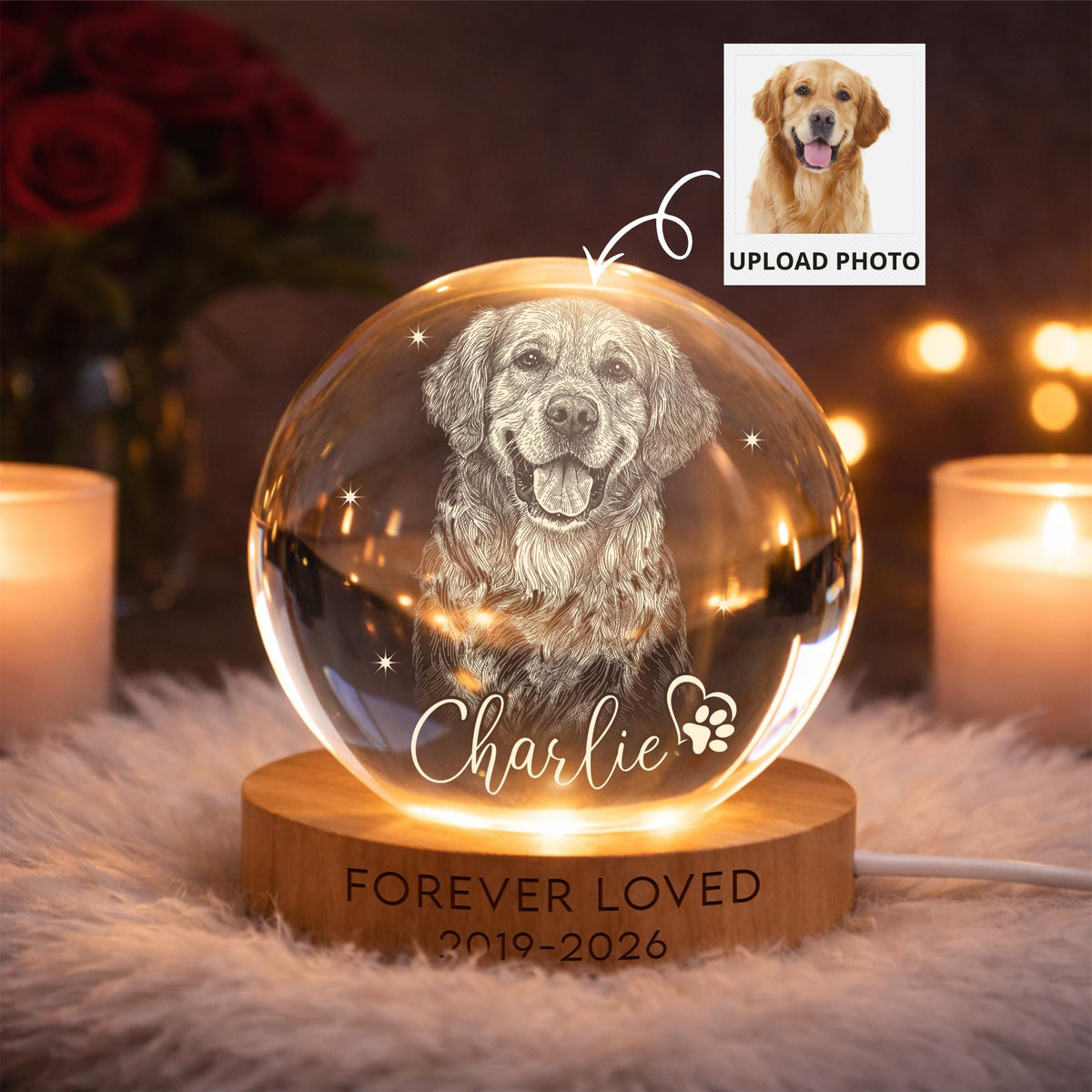 May include: A spherical glass paperweight featuring an etched portrait of a golden retriever, the name Charlie, and a paw print heart. It sits on a circular wooden base engraved with the text FOREVER LOVED 2019-2026, illuminated by internal lights.