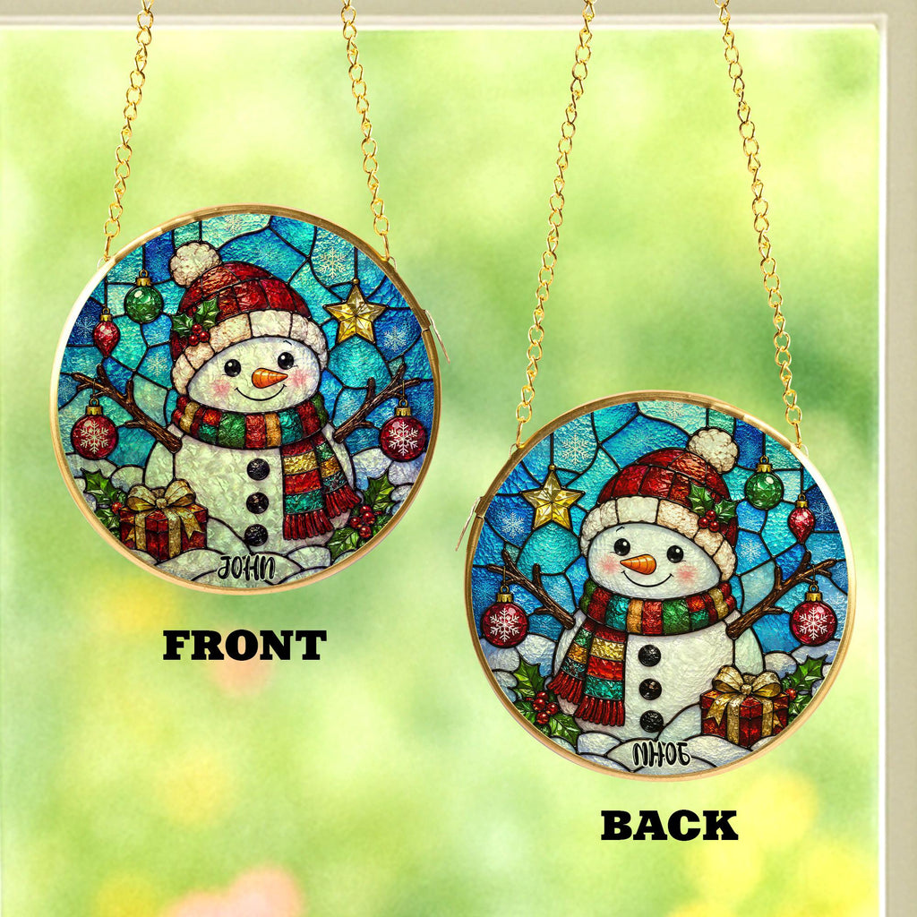 May include: Two circular hanging ornaments featuring a stained-glass style snowman design with a red hat, a multi-colored scarf, and holiday decorations. The left ornament displays the name JOHN, while the right ornament shows the name NHOJ.