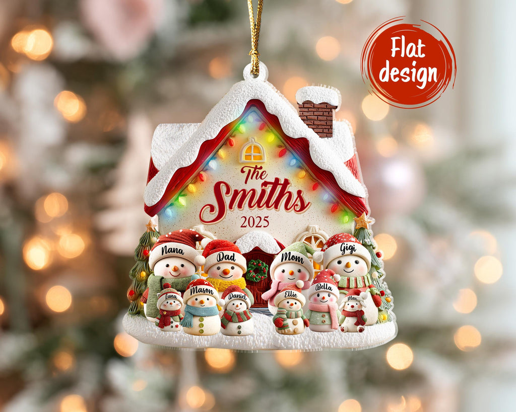 May include: A personalized Christmas ornament shaped like a snow-covered house with the text "The Smiths 2025". The ornament features a family of snowmen, each with a name, and is decorated with colorful lights and a red roof.