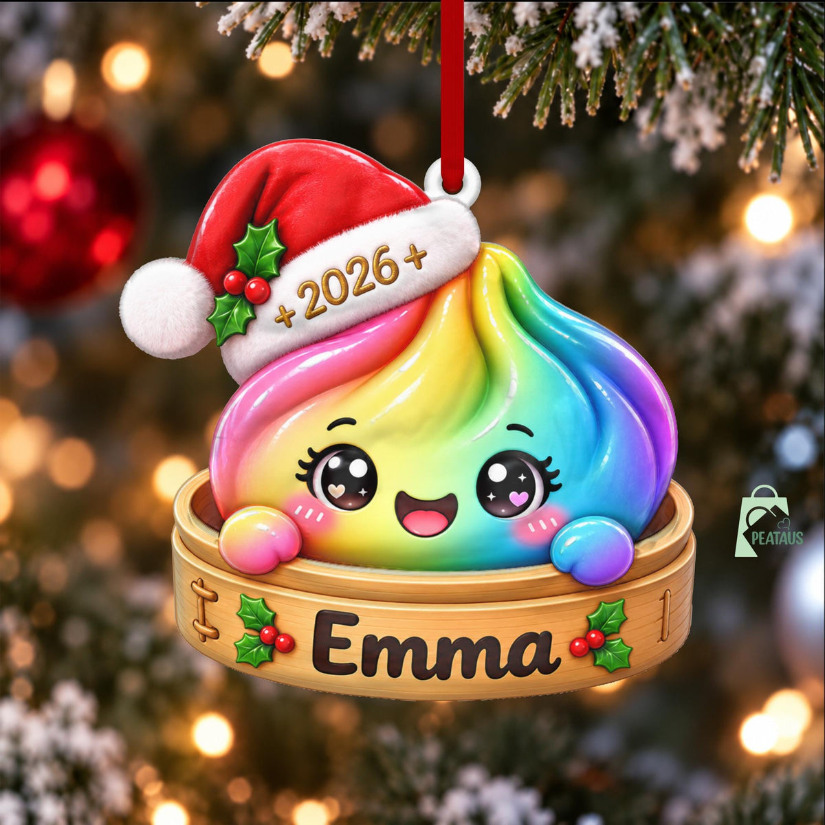 May include: A rainbow-colored dumpling ornament wearing a red Santa hat with the text 2026+. The dumpling sits in a wooden steamer basket labeled with the name Emma and decorated with green holly leaves and red berries, hanging by a red ribbon.