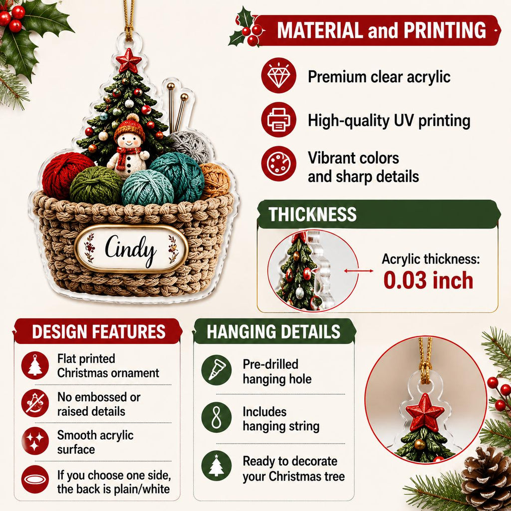 May include: A flat acrylic Christmas ornament featuring a basket filled with colorful yarn balls, a small snowman, and a decorated tree. The basket has a nameplate with the text Cindy. It includes a gold hanging string and is 0.03 inches thick.