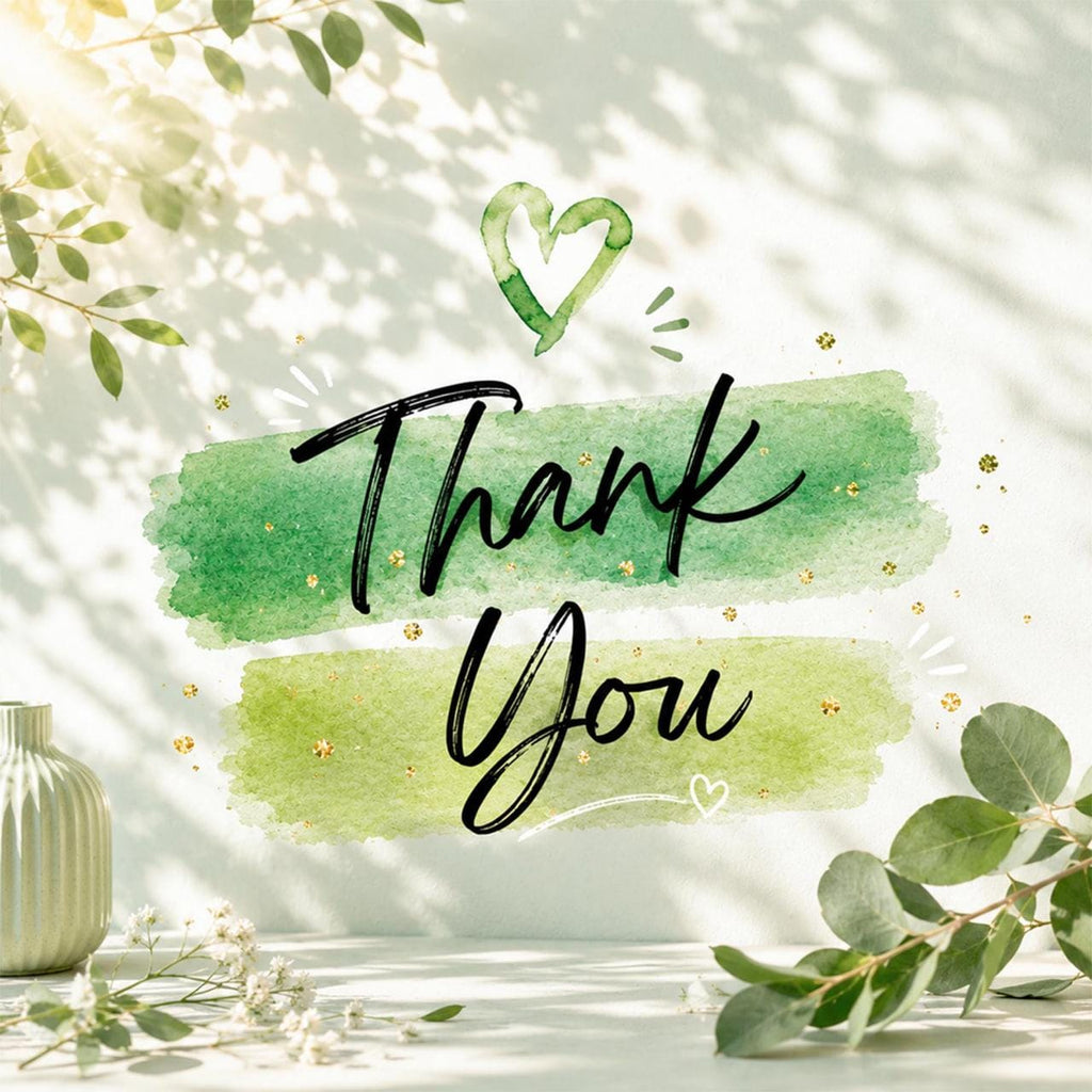 May include: A decorative card featuring the black handwritten text Thank You centered over two horizontal green watercolor brush strokes. A small green heart icon sits above the text, accented by gold glitter flecks and light leaf shadows.