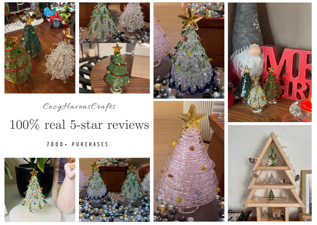 May include: A collection of miniature glass Christmas trees in various colors including clear, green, and pink, each topped with a gold star. The trees feature delicate wire-like glass strands and small colorful glass beads acting as ornaments.