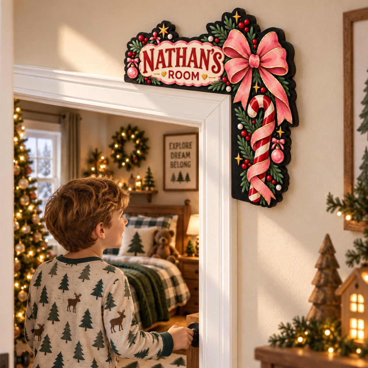 May include: A decorative L-shaped wooden door corner sign featuring the text NATHAN'S ROOM in red lettering. The design includes a large pink bow, a red and white striped candy cane, green pine sprigs, small red berries, and gold star accents.