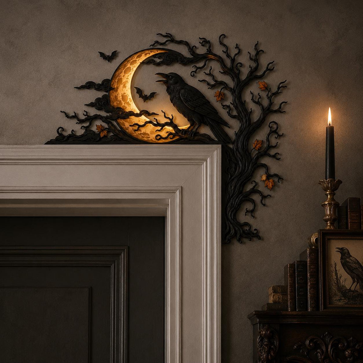 May include: A black decorative door corner accent featuring a crescent moon with a warm glow, a perched raven, and bare tree branches. Small bats are silhouetted against the moon, and orange leaves are scattered among the dark, twisted branches.