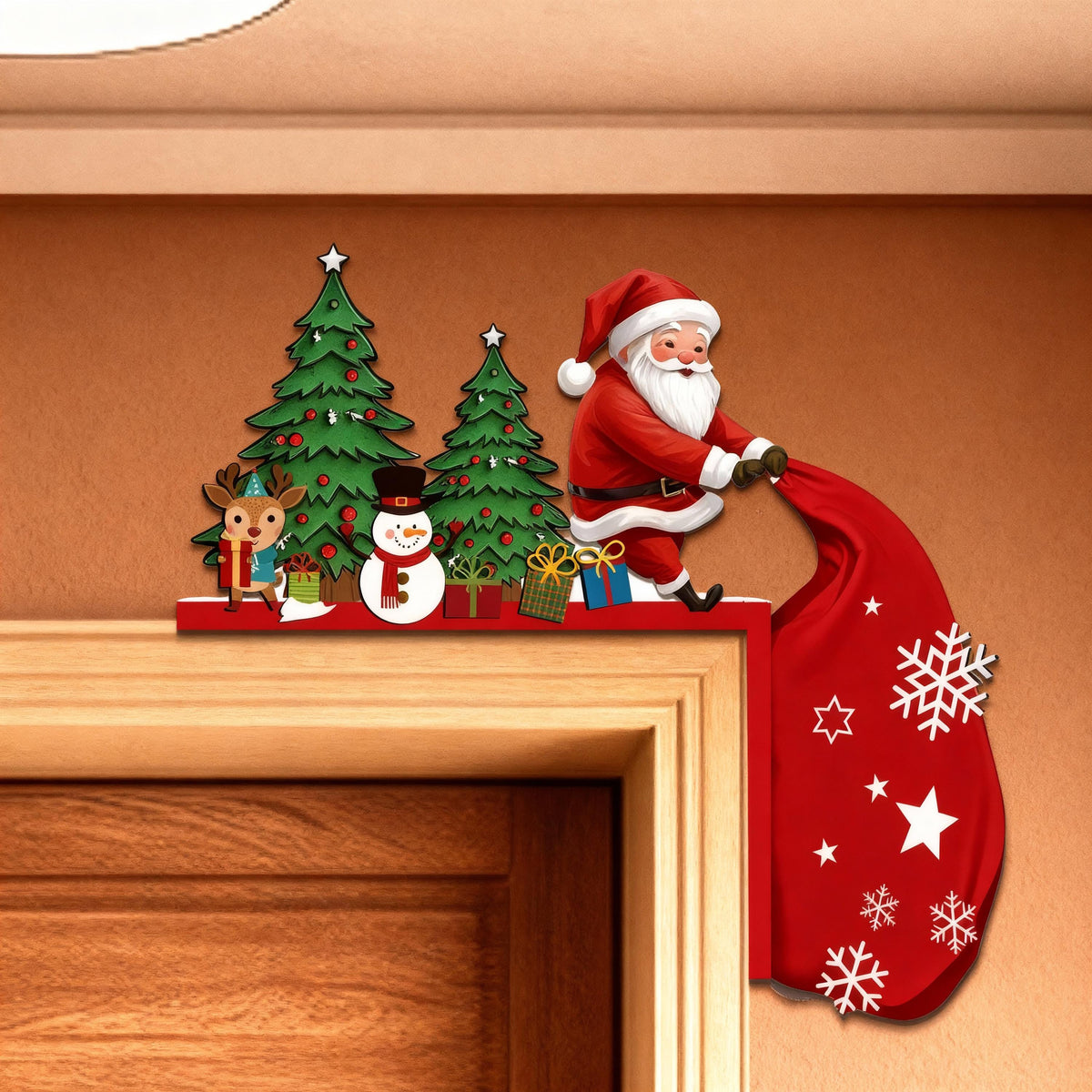 May include: A Christmas-themed door frame decoration featuring Santa Claus, a reindeer, a snowman, and two Christmas trees. Santa is holding a red sack with snowflakes and stars. The decoration is red, green, white, and brown.