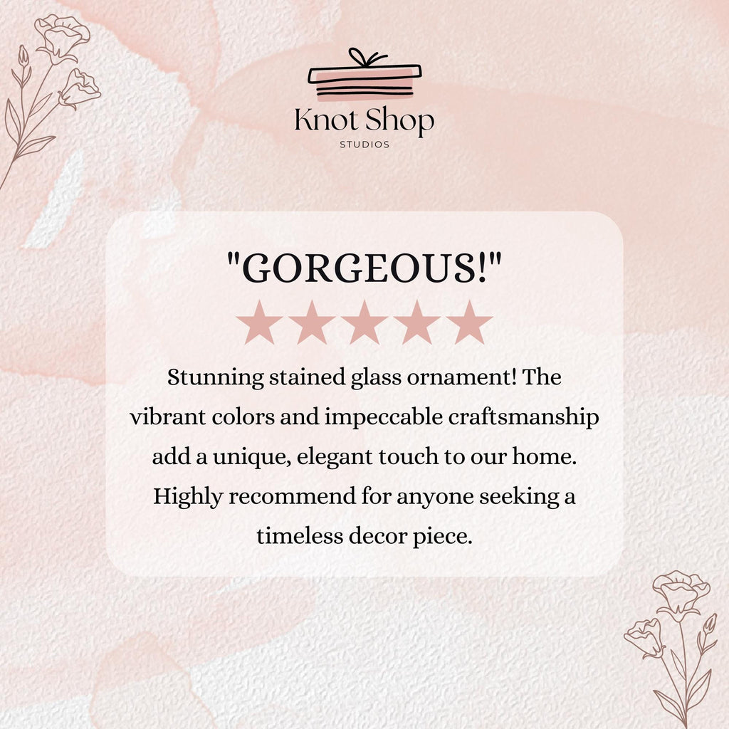 May include: A customer review for a stained glass ornament. The review reads "GORGEOUS!" with five stars and says "Stunning stained glass ornament! The vibrant colors and impeccable craftsmanship add a unique, elegant touch to our home. Highly recommend for anyone seeking a timeless decor piece."