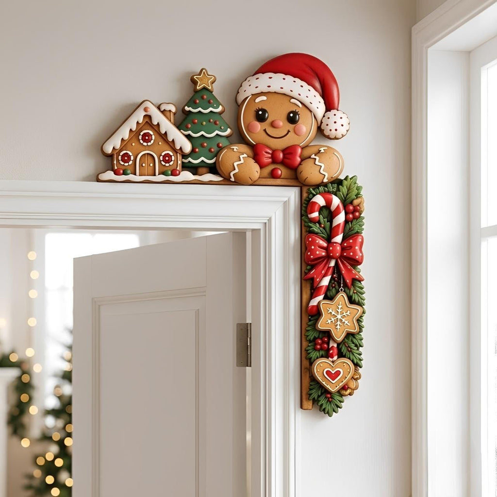 May include: A decorative Christmas door corner sign featuring a gingerbread person wearing a red Santa hat, a gingerbread house, and a green tree on the top. The vertical side displays a candy cane, a red bow, and hanging cookie ornaments.