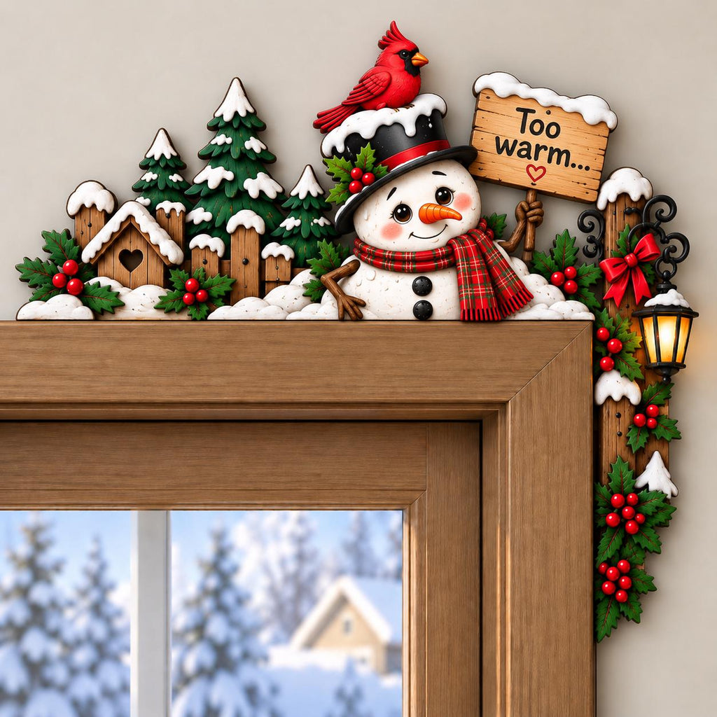 May include: A decorative wooden door corner topper featuring a snowman wearing a black top hat with a red cardinal on top and a red plaid scarf. The snowman holds a sign that reads Too warm... with a heart. Includes pine trees, holly, and a lantern.