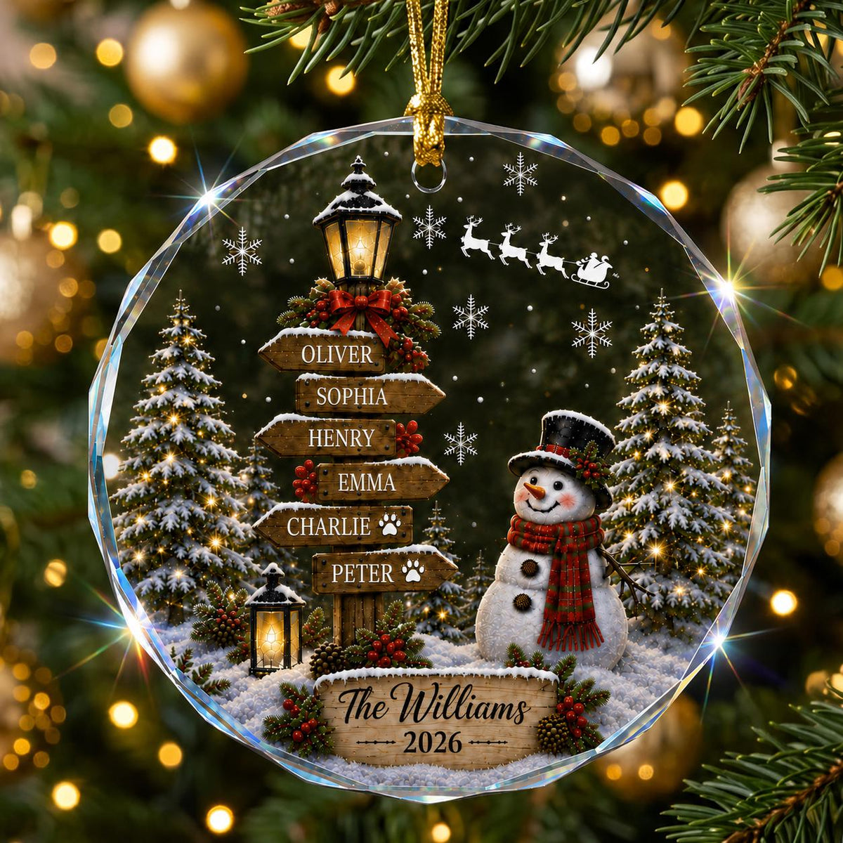 May include: A round, clear glass Christmas ornament featuring a winter scene with a snowman wearing a red scarf and top hat, a wooden signpost with the names Oliver, Sophia, Henry, Emma, Charlie, and Peter, and a sign reading The Williams 2026.