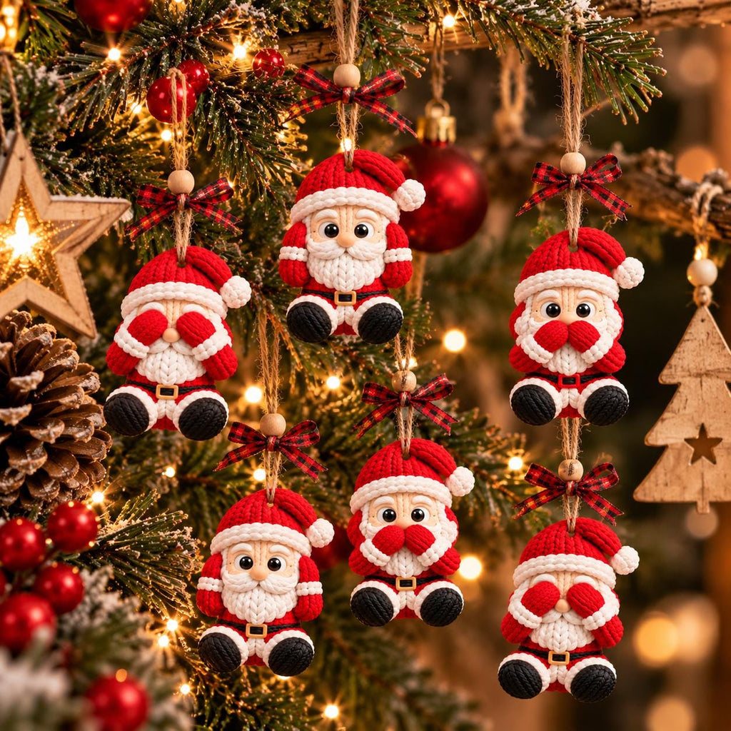 May include: Six hanging Christmas ornaments shaped like Santa Claus figures. Each figure wears a red and white knit hat, a red and white knit suit, and black boots. The figures are suspended by twine with a small red and black plaid bow.