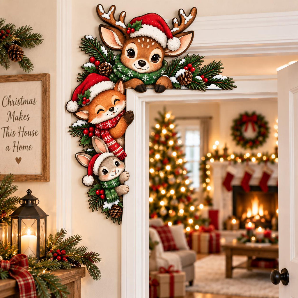 May include: A decorative wooden door corner sign featuring a cartoon reindeer, fox, and rabbit wearing Santa hats and scarves, accented with pine branches, red berries, and pinecones, designed to frame the upper corner of a door frame.