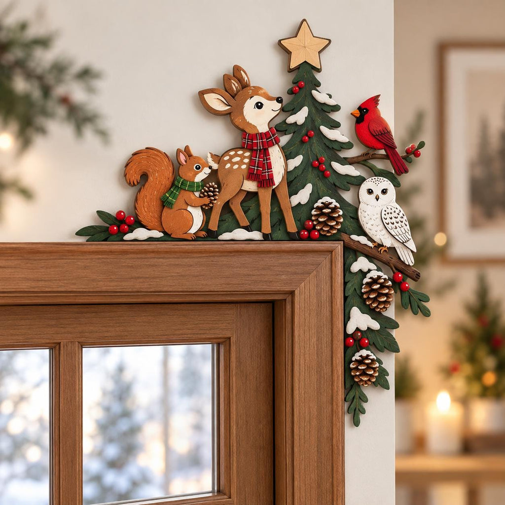 May include: A wooden door corner decoration featuring a brown deer with a red plaid scarf, a squirrel with a green scarf, a white owl, and a red cardinal perched on a green pine tree with snow-dusted branches, pinecones, red berries, and a star.